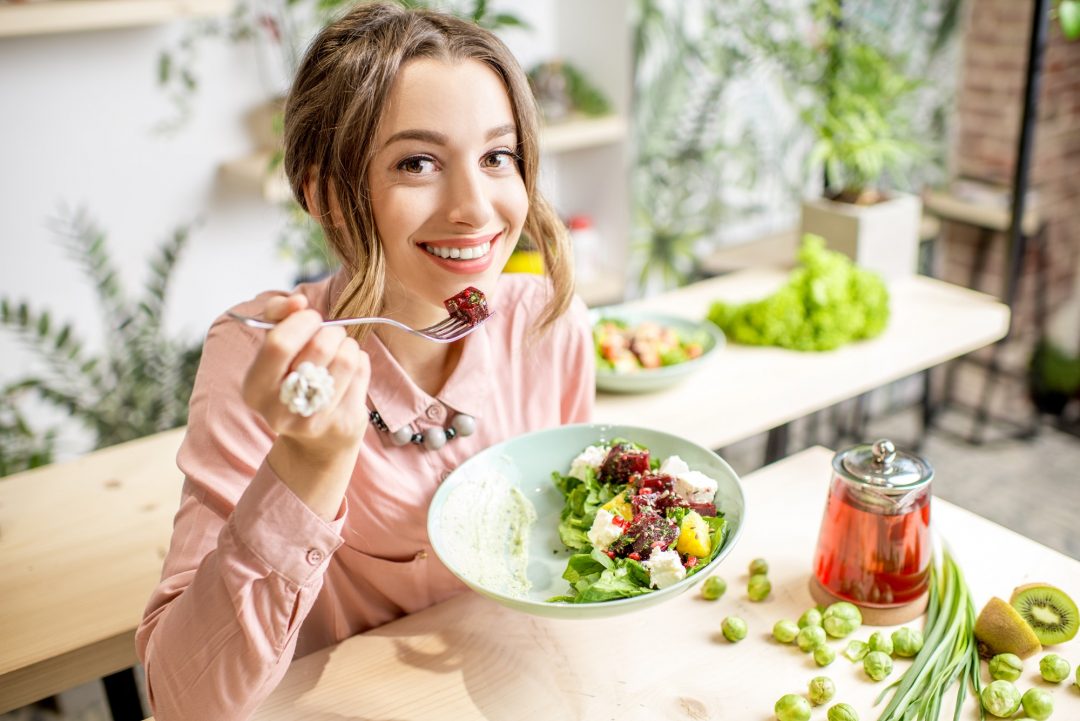 woman-eating-healthy-green-food.jpg